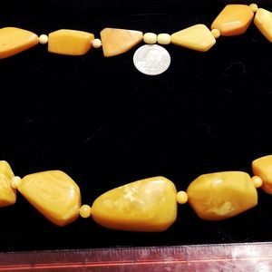 Egg yolk yellow early resin, acrylic, or bakelite beaded necklace.